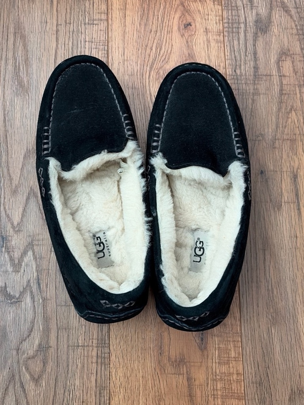 UGG women’s Black Shearling Lined Moccasin Slippers